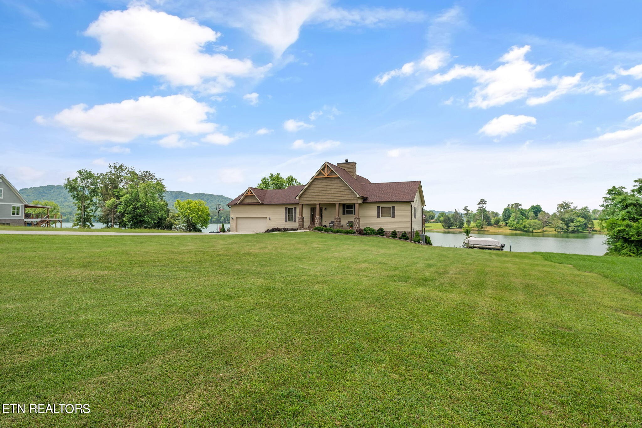 296 Shields Crossing Drive Bean Station, TN 37708 - Photo 3 of 52 a view of a house with a big yard