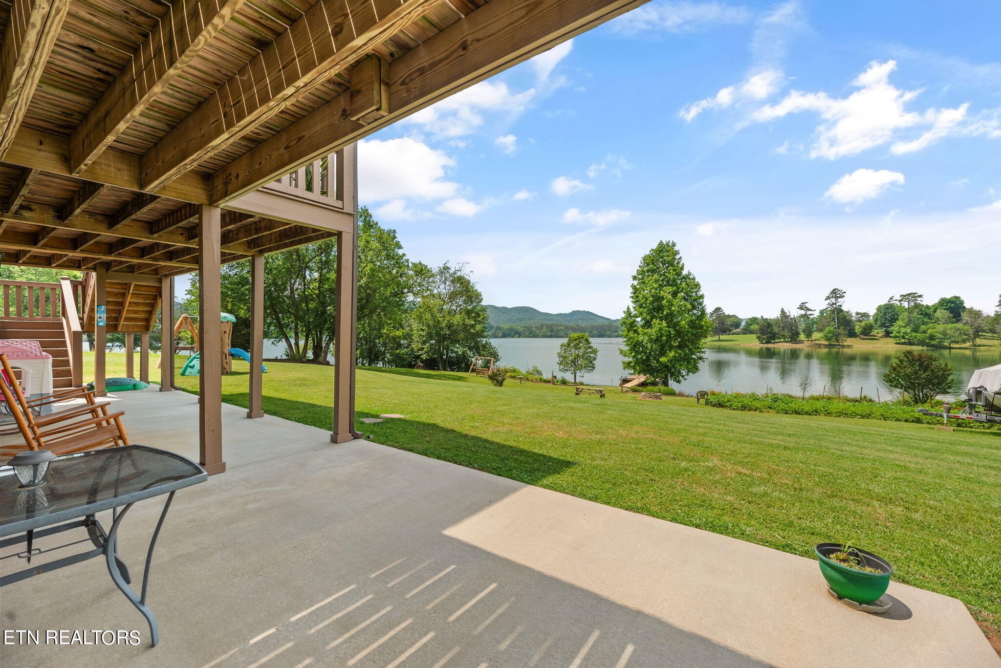 296 Shields Crossing Drive Bean Station, TN 37708 - Photo 36 of 52 a view of a backyard with sitting area