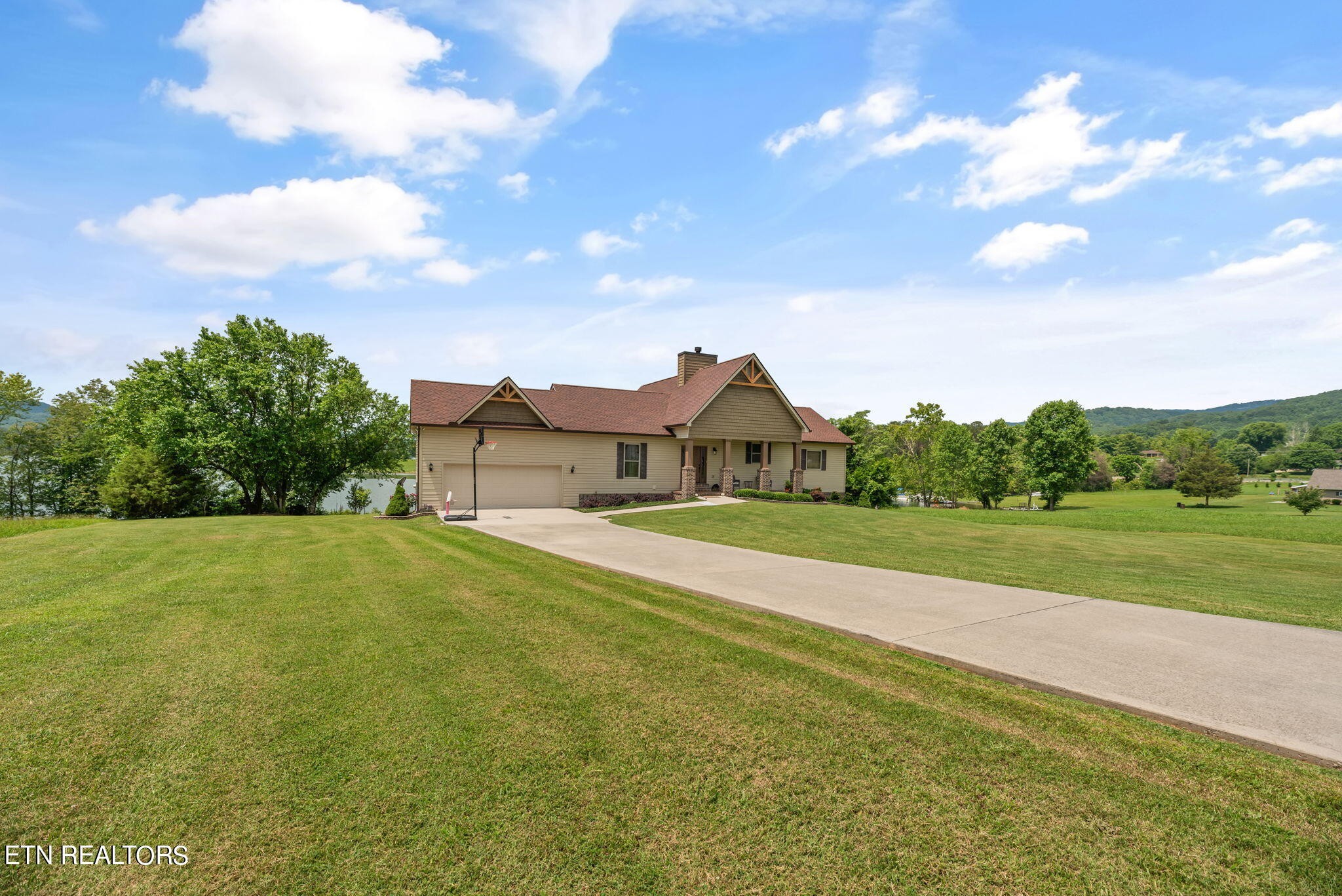 296 Shields Crossing Drive Bean Station, TN 37708 - Photo 4 of 52 a front view of a house with a yard