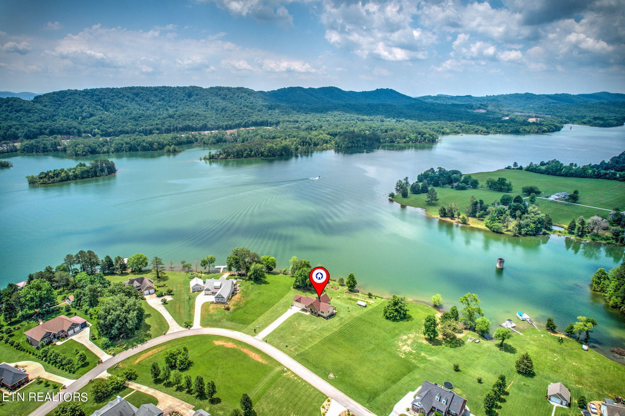 296 Shields Crossing Drive Bean Station, TN 37708 - Photo 45 of 52 an aerial view of lake residential house with swimming pool and outdoor seating