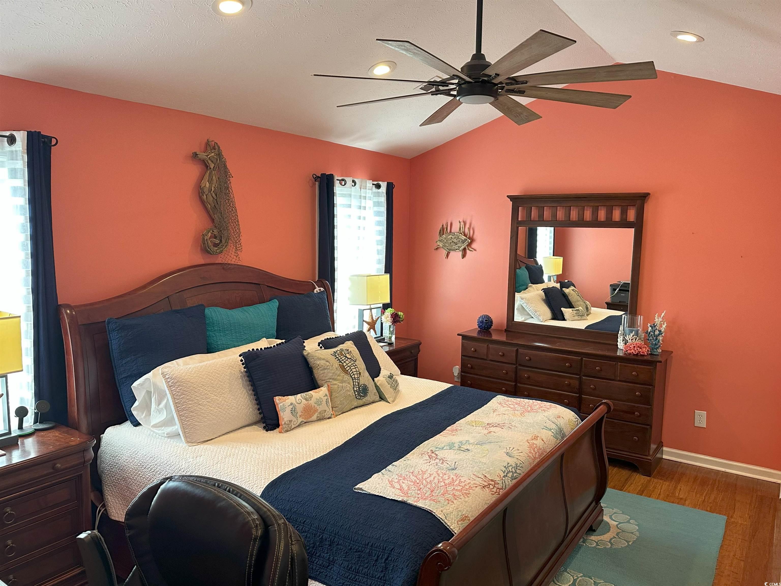 810 Marlin Court Murrells Inlet, SC 29576 - Photo 20 of 40 Bedroom with wood finished floors, vaulted ceiling, recessed lighting, and ceiling fan
