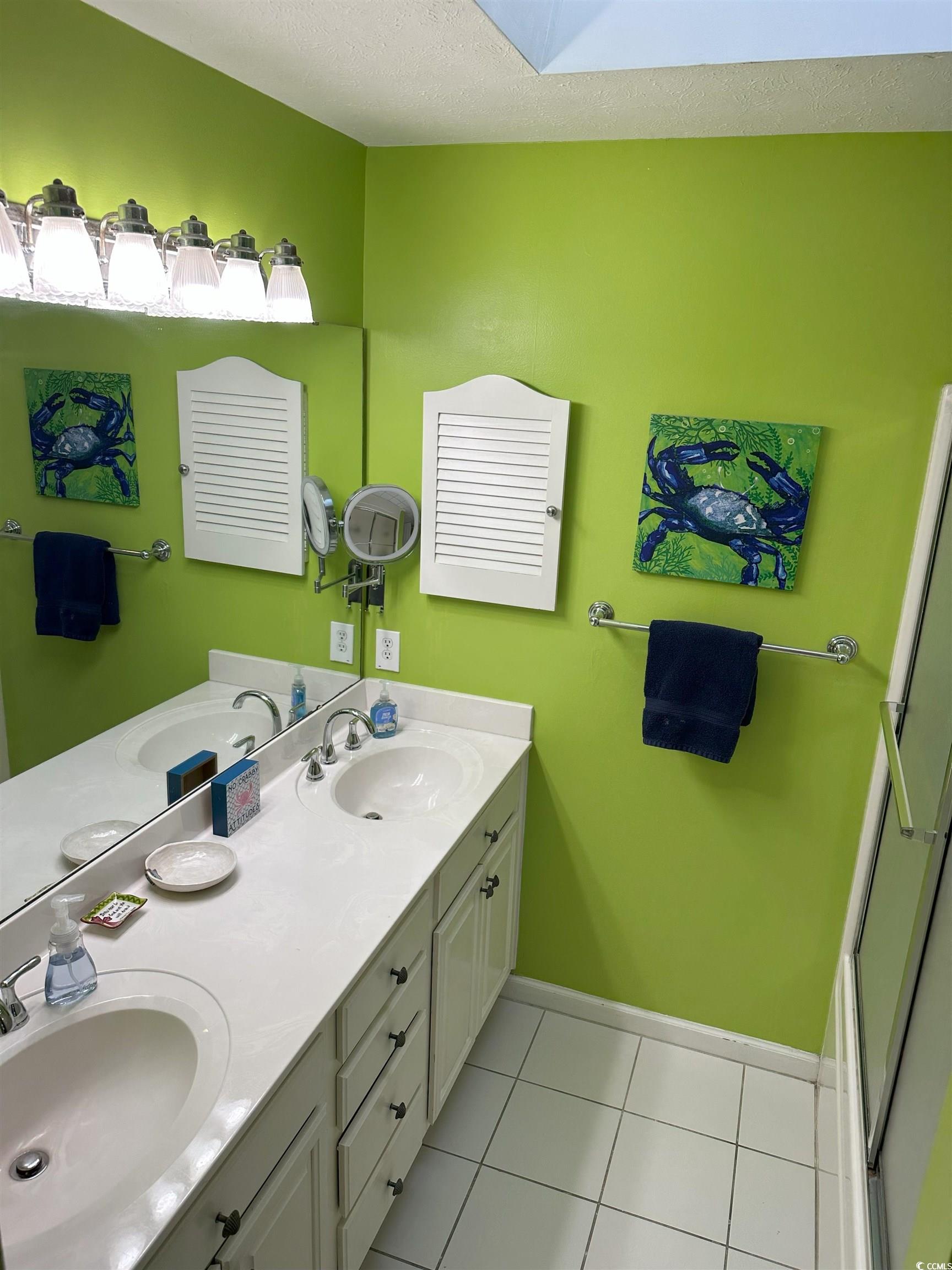 810 Marlin Court Murrells Inlet, SC 29576 - Photo 24 of 40 Full bath with double vanity and tile patterned floors