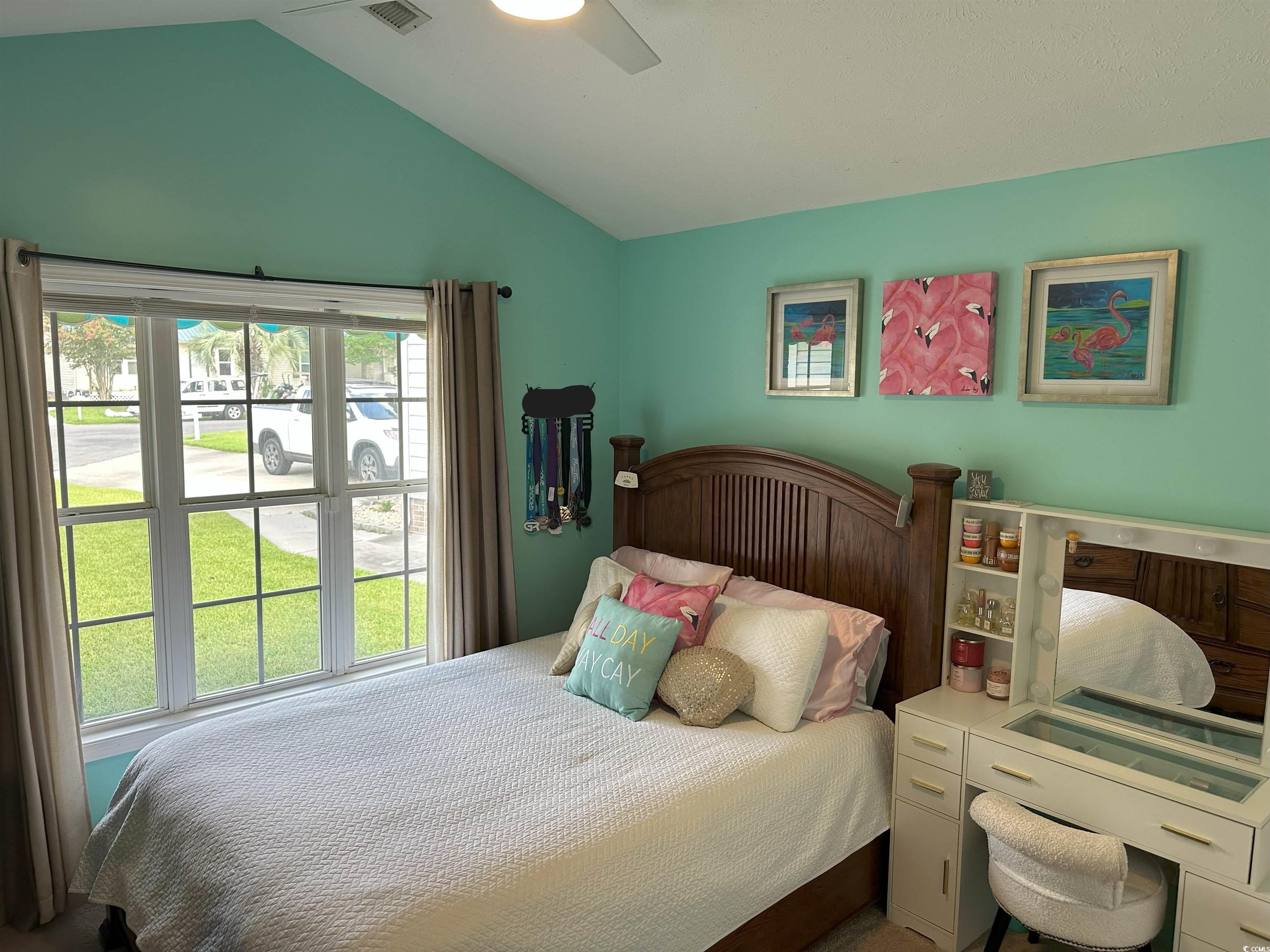 810 Marlin Court Murrells Inlet, SC 29576 - Photo 26 of 40 Bedroom featuring lofted ceiling and ceiling fan