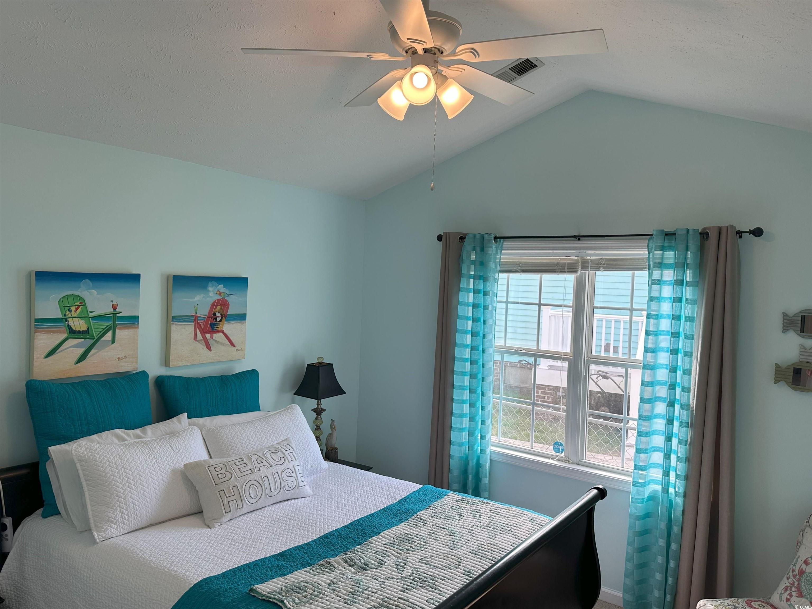 810 Marlin Court Murrells Inlet, SC 29576 - Photo 29 of 40 Bedroom featuring vaulted ceiling and a ceiling fan