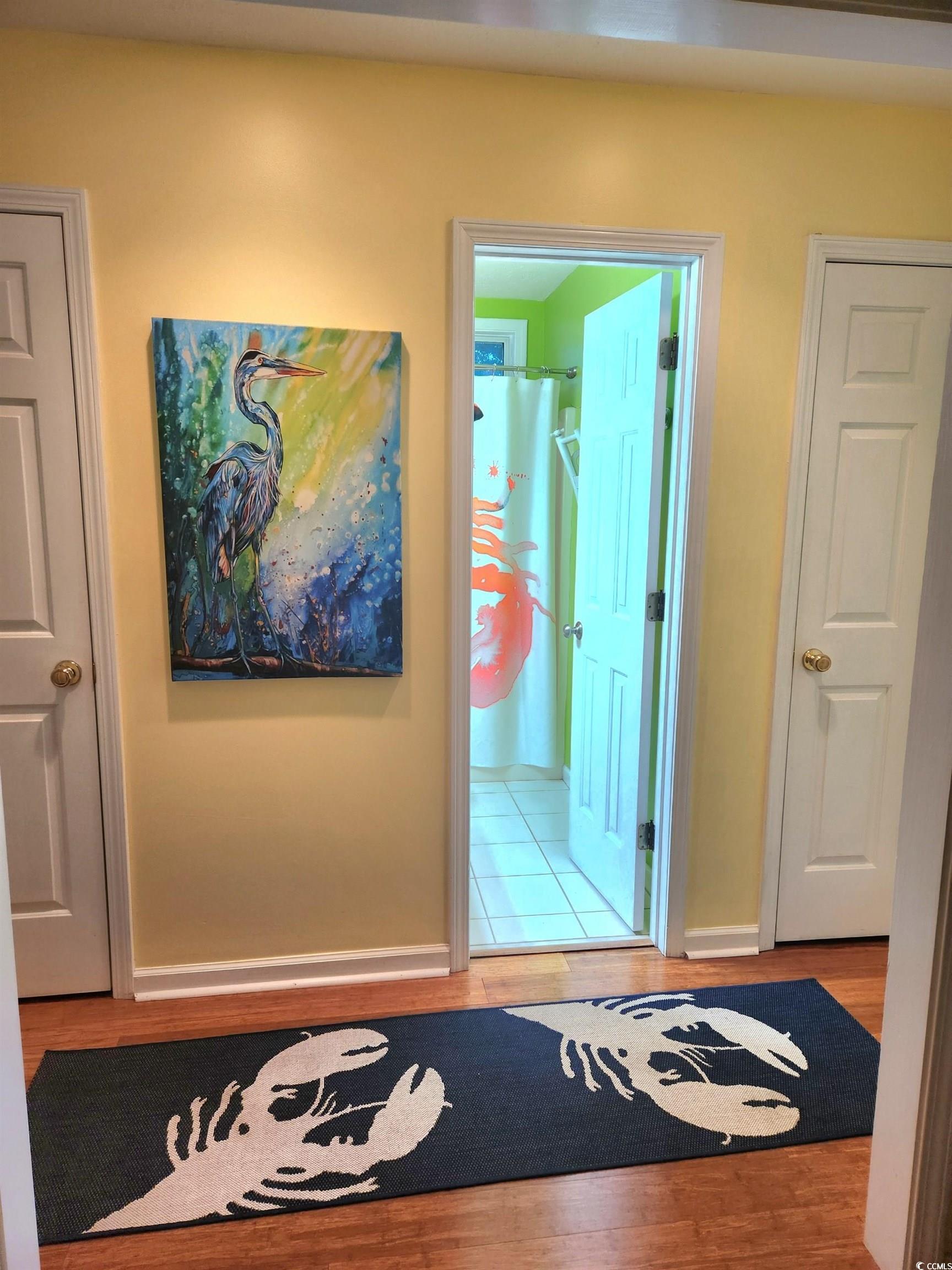 810 Marlin Court Murrells Inlet, SC 29576 - Photo 33 of 40 Hall featuring wood finished floors and baseboards