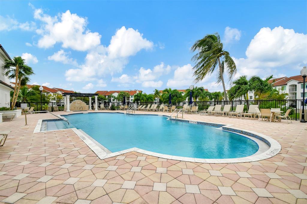 1312 Villa Lane, Unit 1312 Boynton Beach, FL 33435 - Photo 11 of 34 a view of outdoor space yard and swimming pool