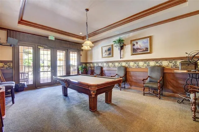 a room with furniture and a chandelier