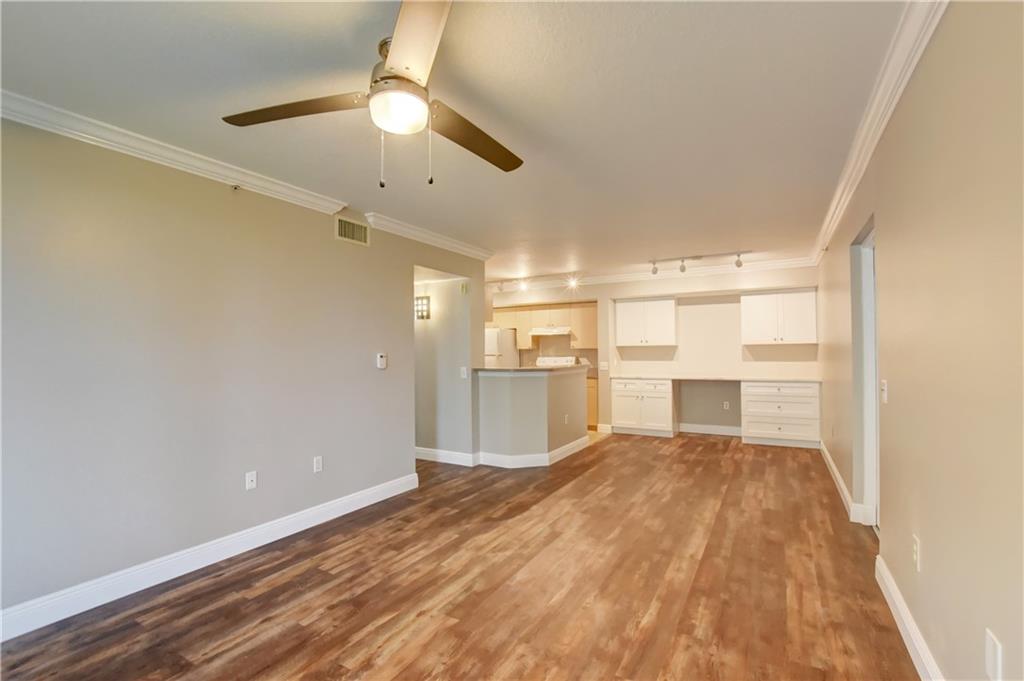 1312 Villa Lane, Unit 1312 Boynton Beach, FL 33435 - Photo 26 of 34 a view of a kitchen with a sink and a window