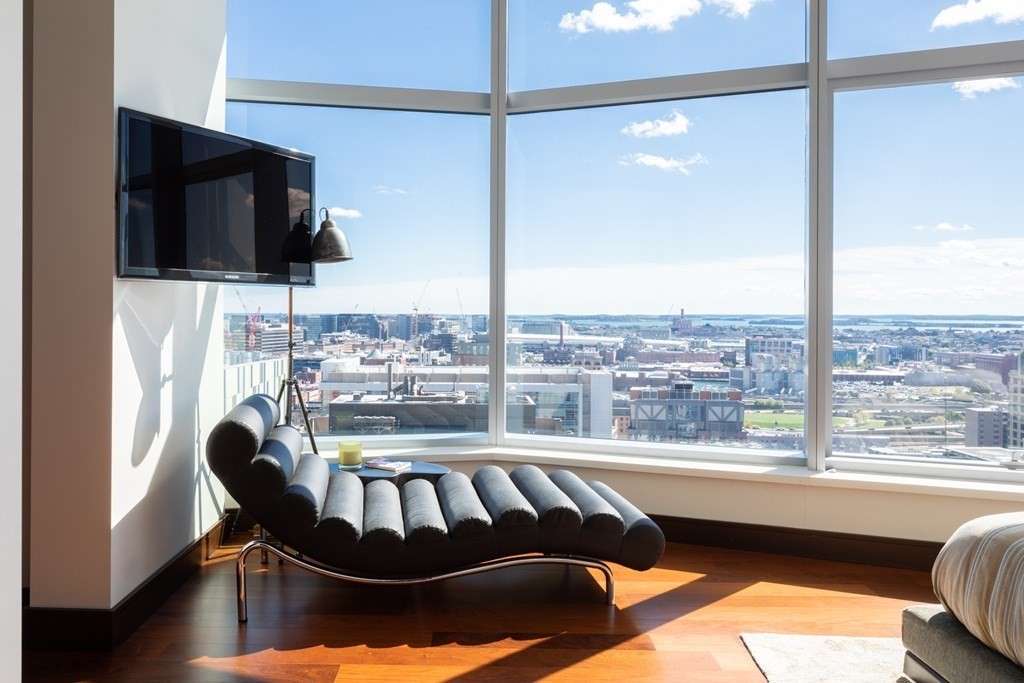 110 Stuart Street, Unit PH04 Boston, MA 02116 - Photo 24 of 36 a view of a balcony with furniture