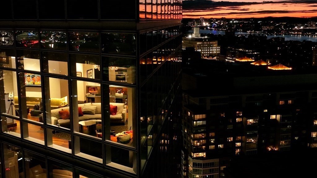 110 Stuart Street, Unit PH04 Boston, MA 02116 - Photo 29 of 36 a room with lots of bottles of alcohol