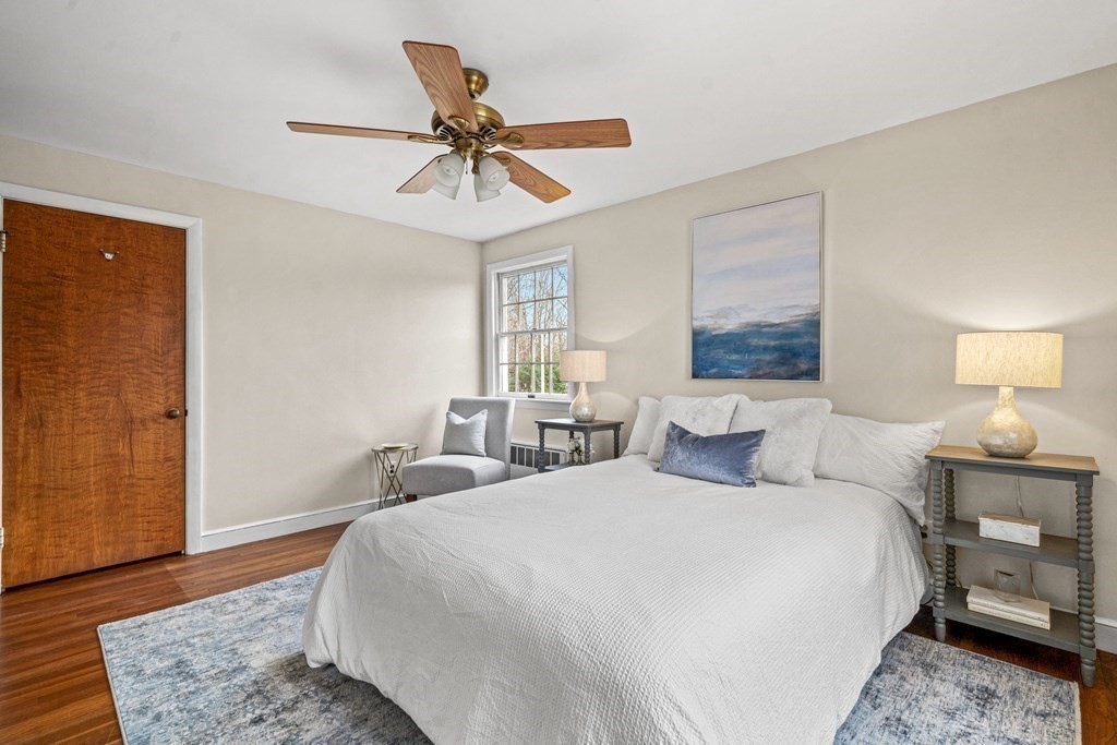 277 Webster Street Needham, MA 02494 - Photo 11 of 17 a bedroom with a bed and wooden floor