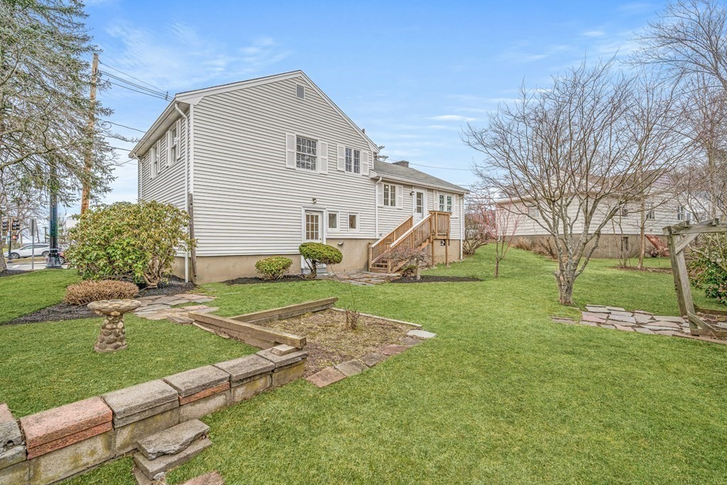 277 Webster Street Needham, MA 02494 - Photo 17 of 17 a view of a house with a backyard