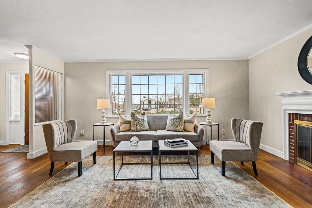 277 Webster Street Needham, MA 02494 - Photo 2 of 17 a living room with furniture and a window