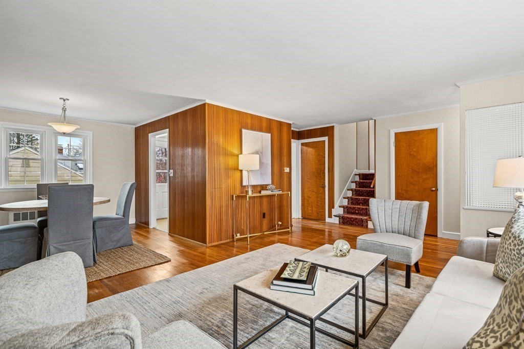 277 Webster Street Needham, MA 02494 - Photo 4 of 17 a living room with furniture a rug and a window