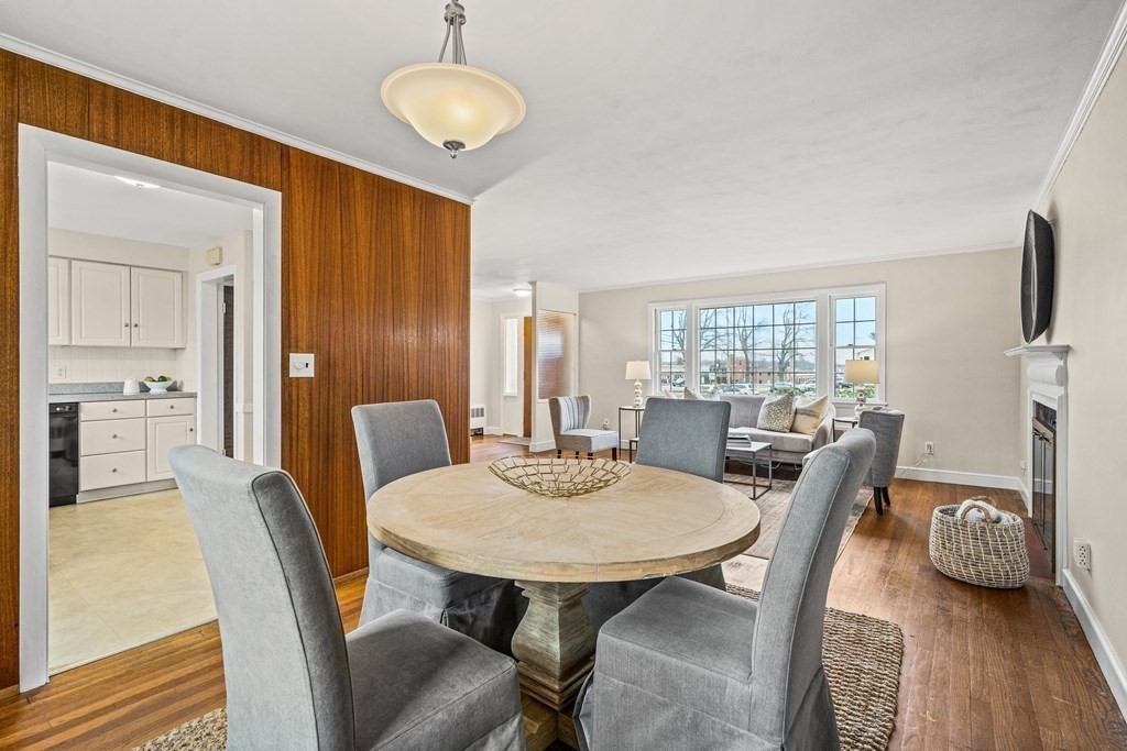 277 Webster Street Needham, MA 02494 - Photo 6 of 17 a view of a dining room with furniture and wooden floor