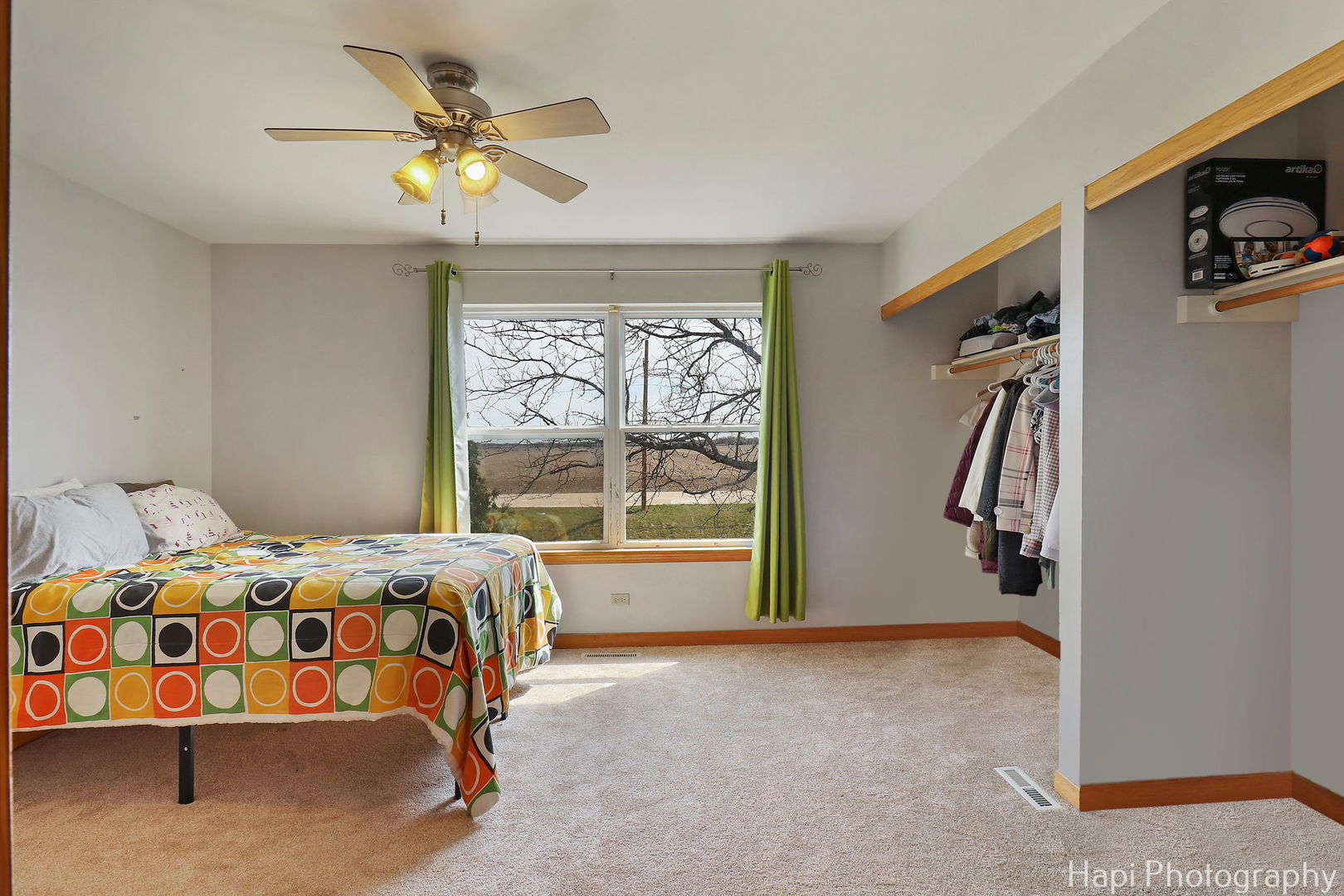 809 Village Circle Marengo, IL 60152 - Photo 13 of 19 a bedroom with a bed and a window