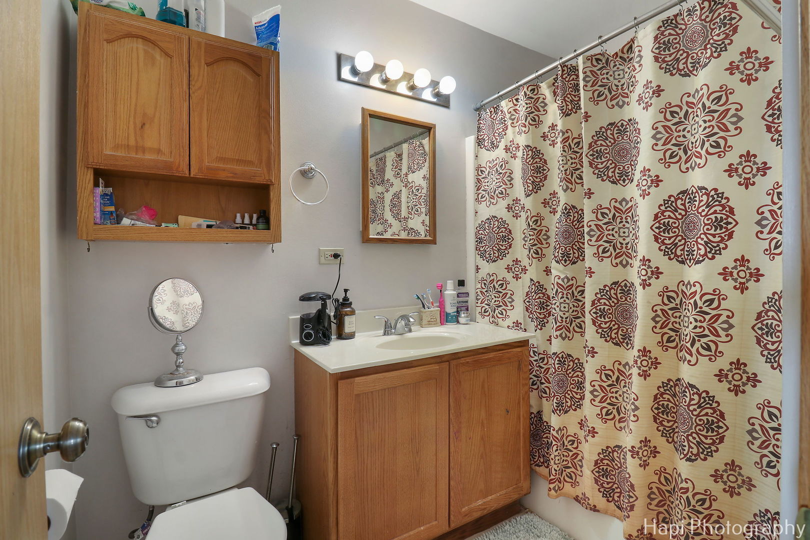 809 Village Circle Marengo, IL 60152 - Photo 16 of 19 a bathroom with a sink toilet and shower