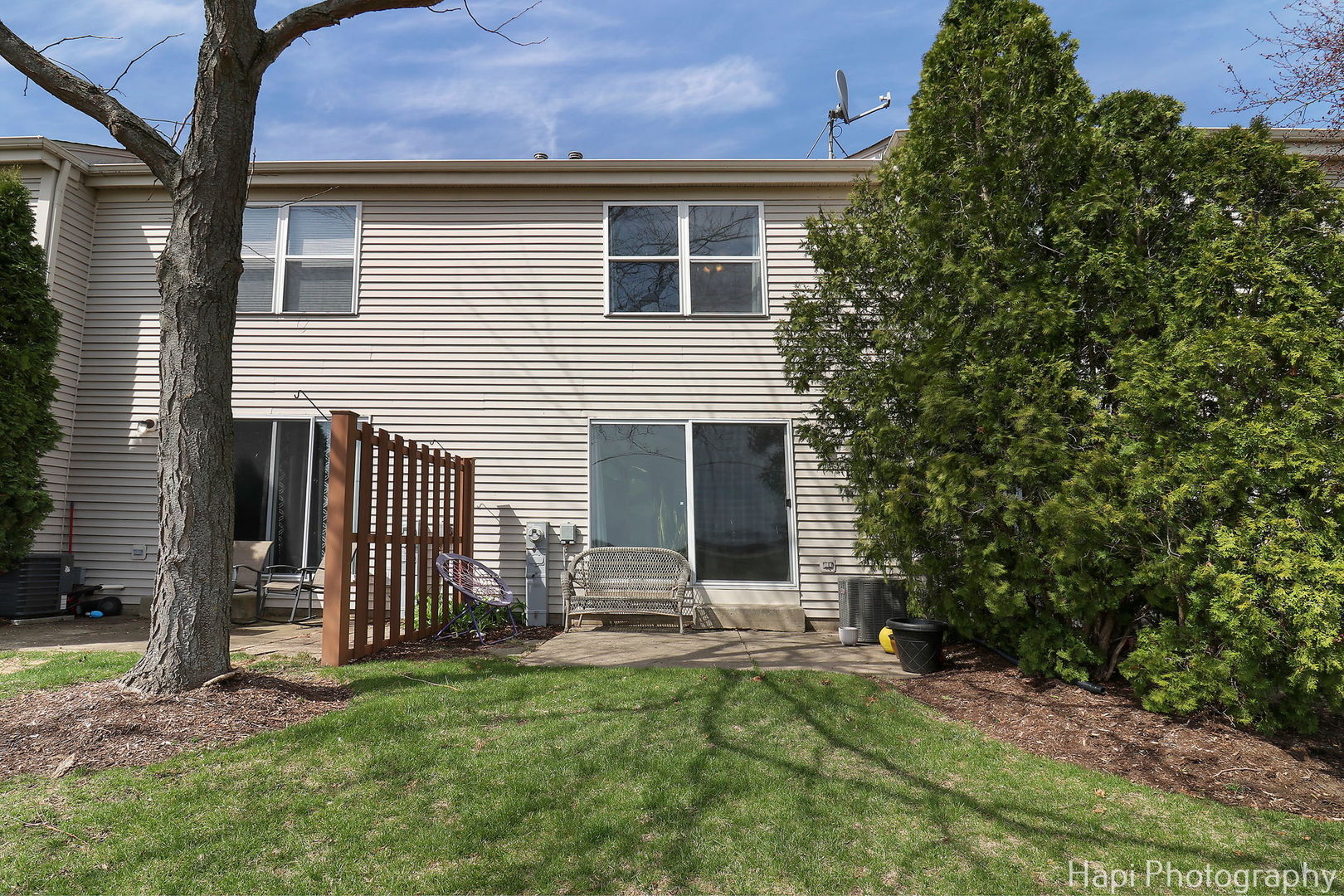 809 Village Circle Marengo, IL 60152 - Photo 18 of 19 a backyard of a house with table and chairs