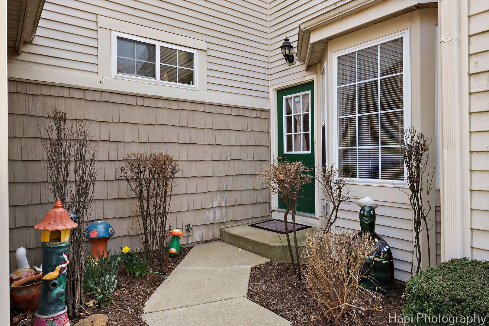 809 Village Circle Marengo, IL 60152 - Photo 19 of 19 a backyard of a house with outdoor seating