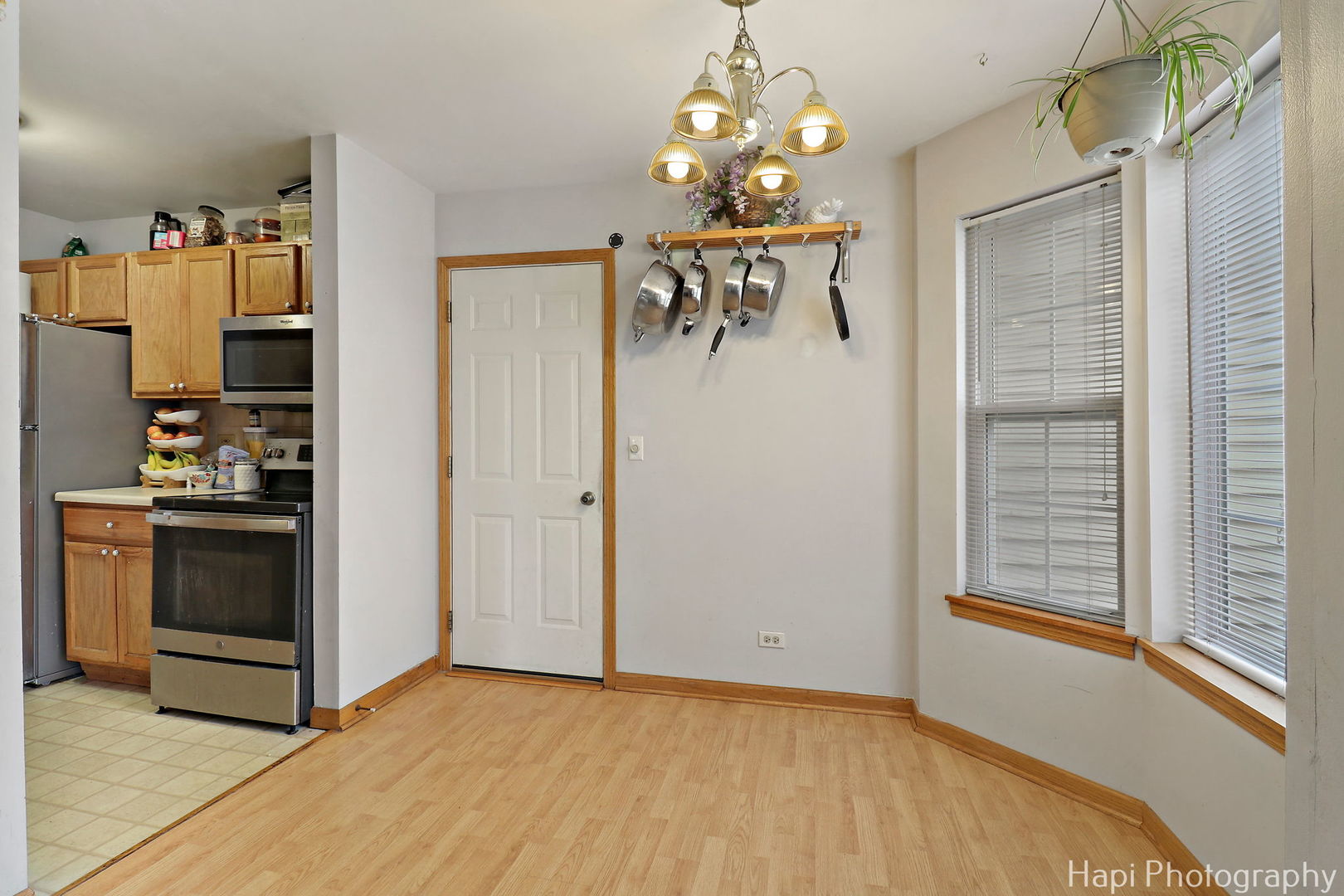 809 Village Circle Marengo, IL 60152 - Photo 5 of 19 a view of a kitchen with a sink and cabinets