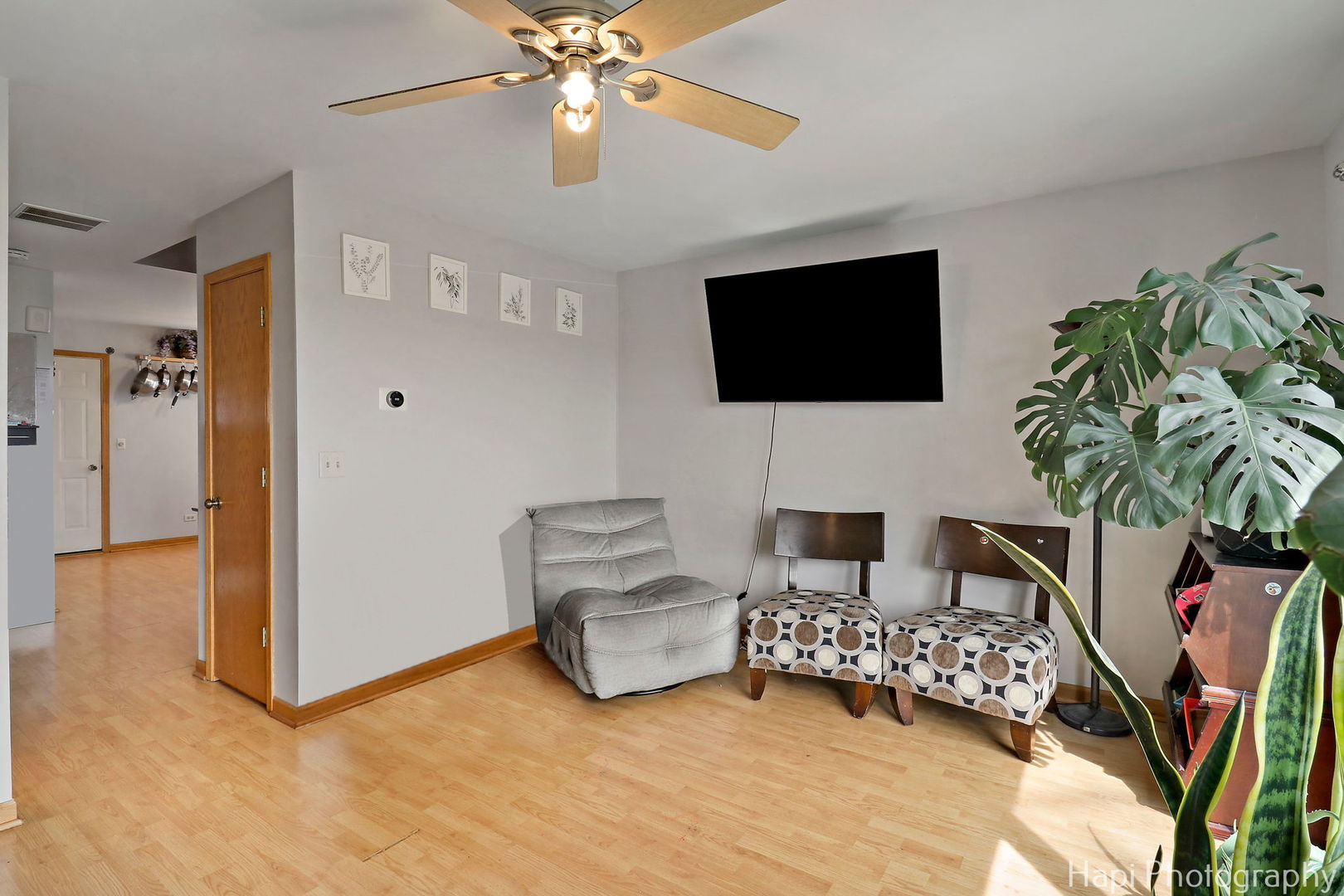 809 Village Circle Marengo, IL 60152 - Photo 9 of 19 a living room with furniture and a flat screen tv