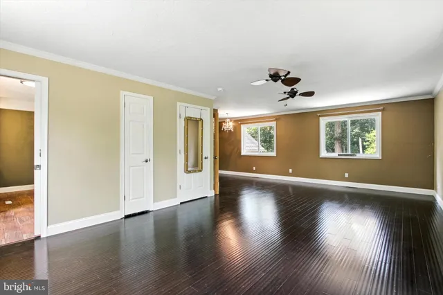 a very nice looking room with a dining table and chairs