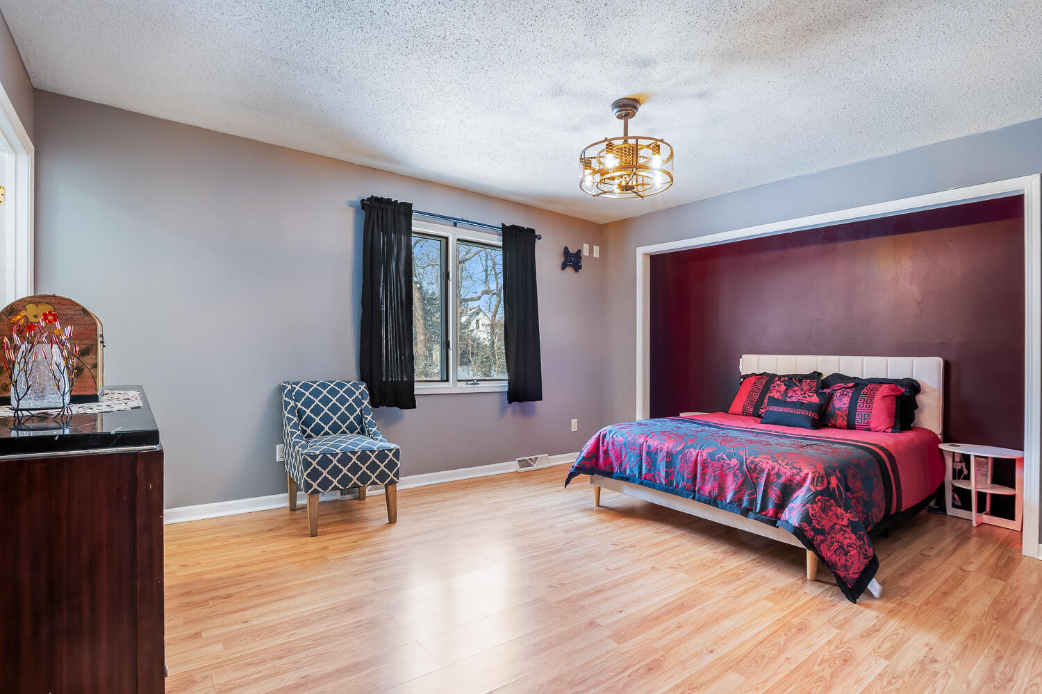 1852 South 100 West Knox, IN 46534 - Photo 5 of 13 a bedroom with a bed and wooden floor