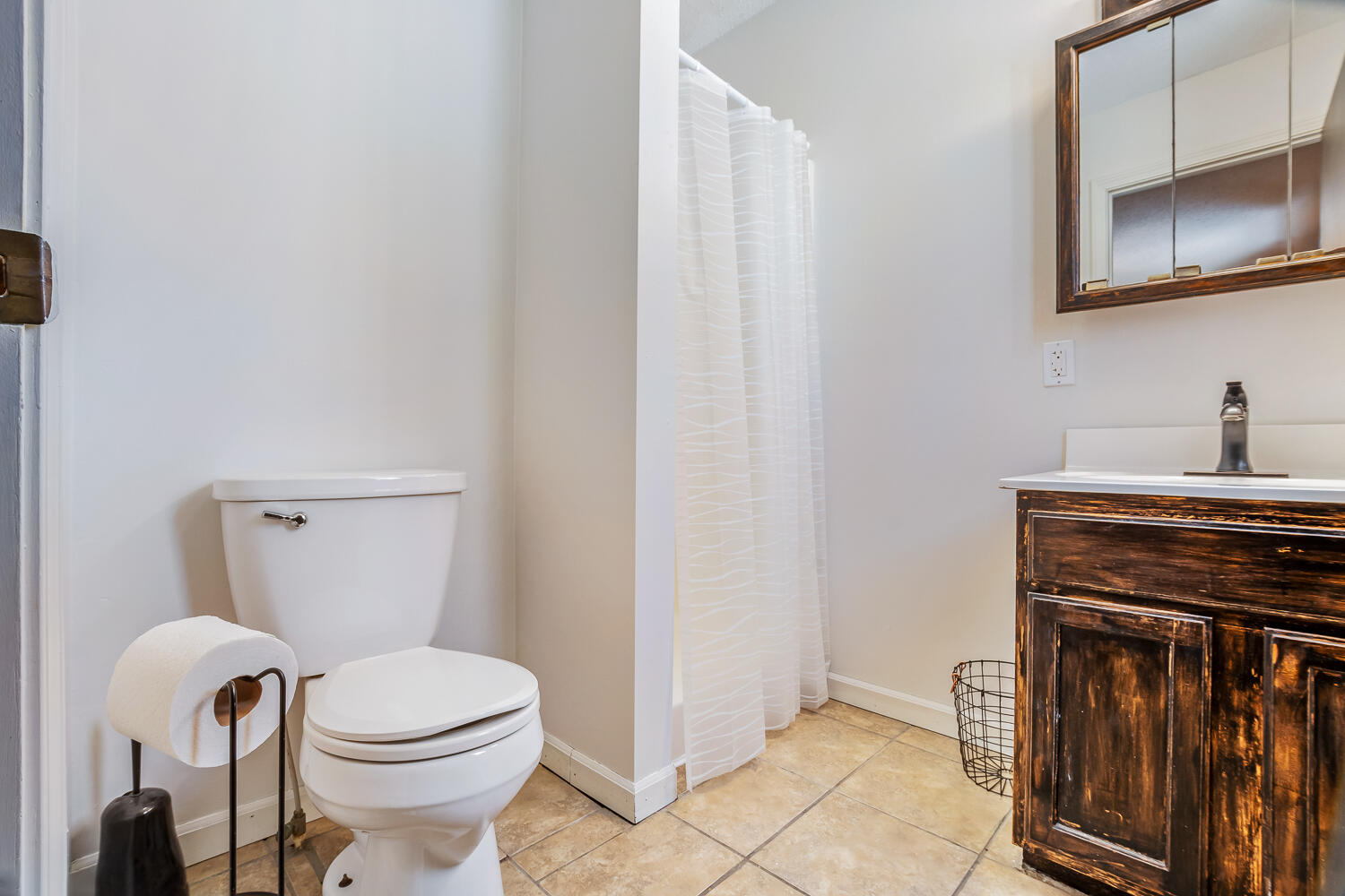 1852 South 100 West Knox, IN 46534 - Photo 6 of 13 a bathroom with a toilet and a sink