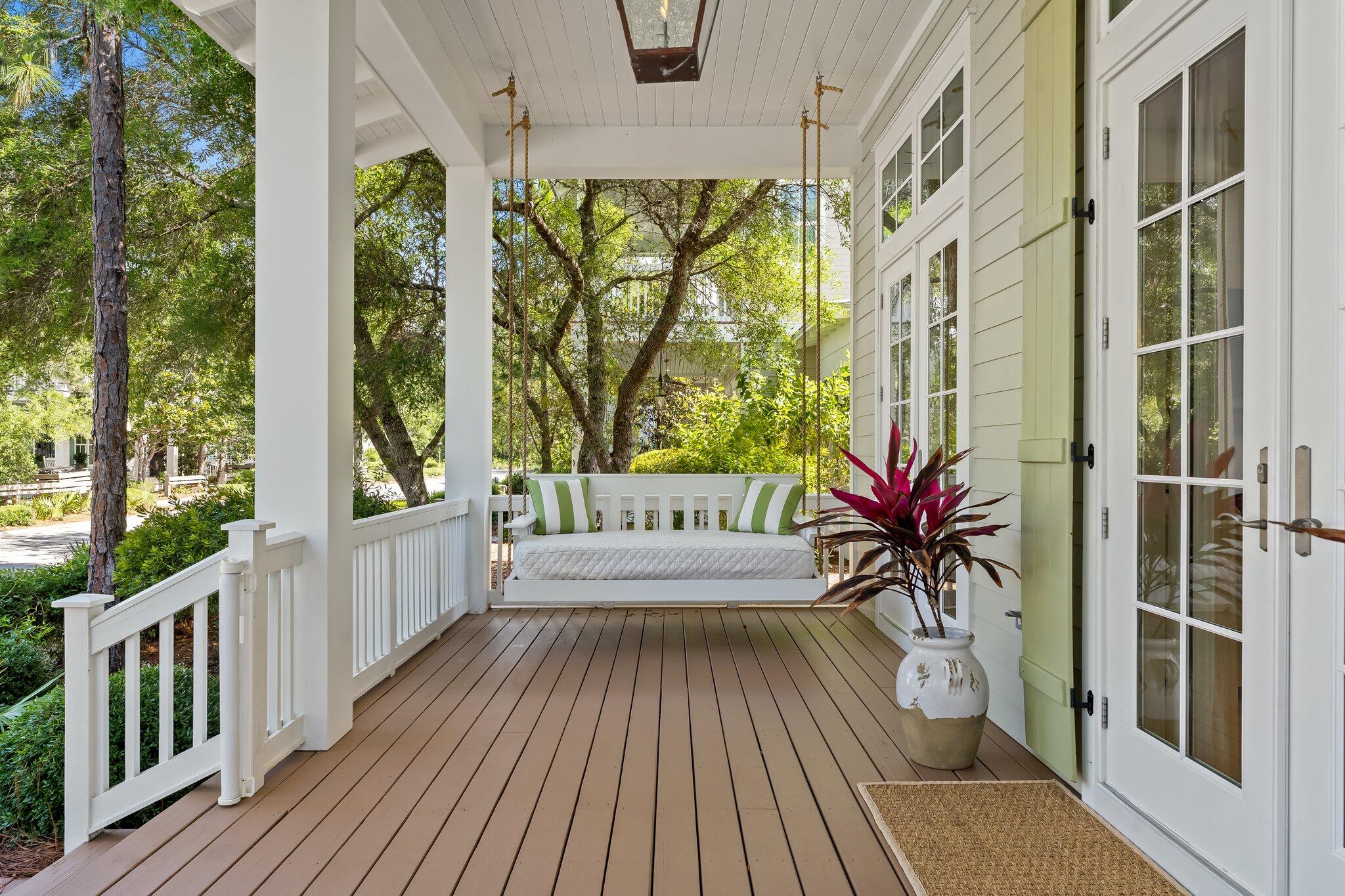 56 South Wisteria Way Santa Rosa Beach, FL 32459 - Photo 11 of 77 a view of a balcony with chairs
