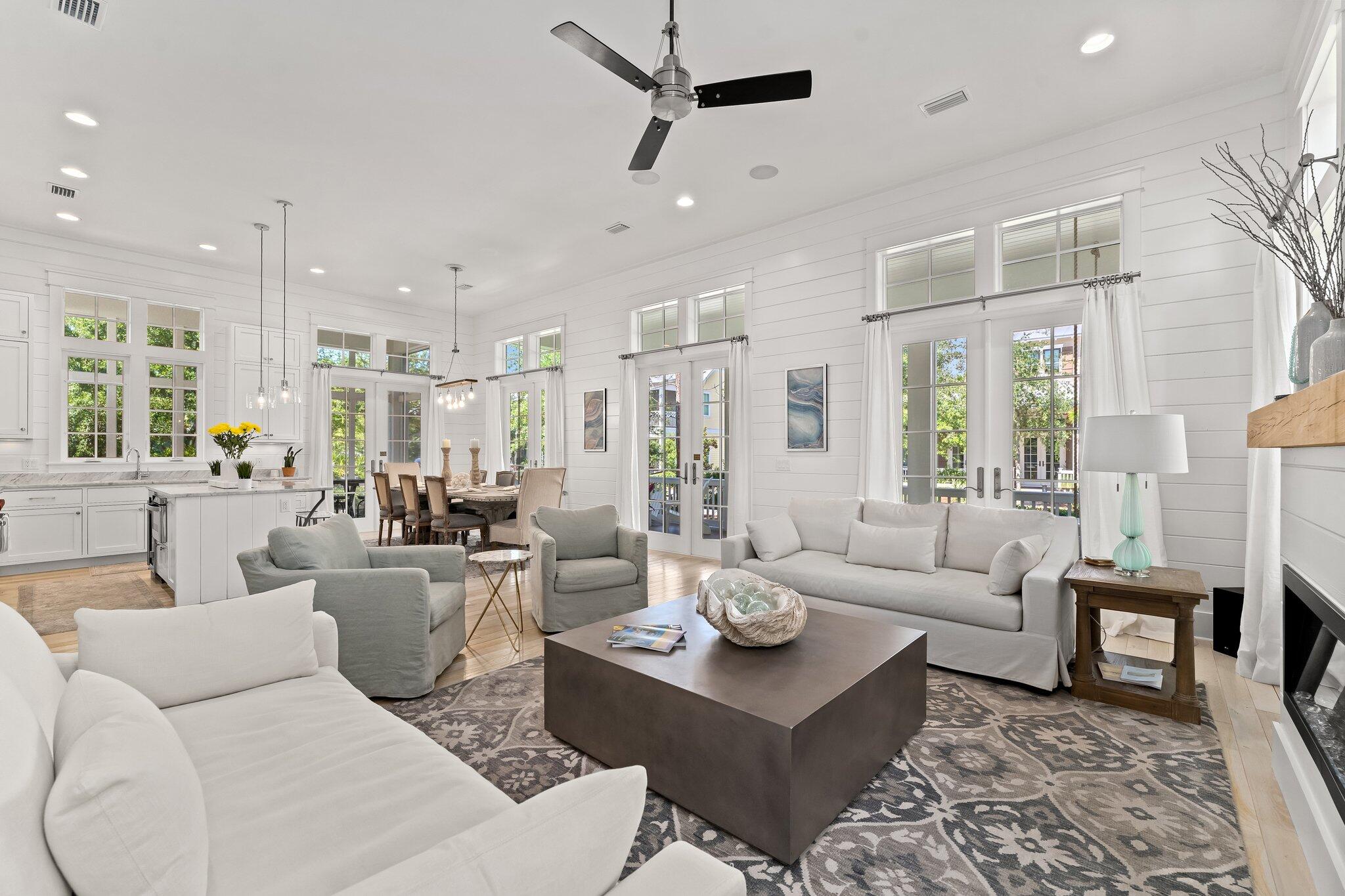 56 South Wisteria Way Santa Rosa Beach, FL 32459 - Photo 20 of 77 a living room with lots of white furniture and a table