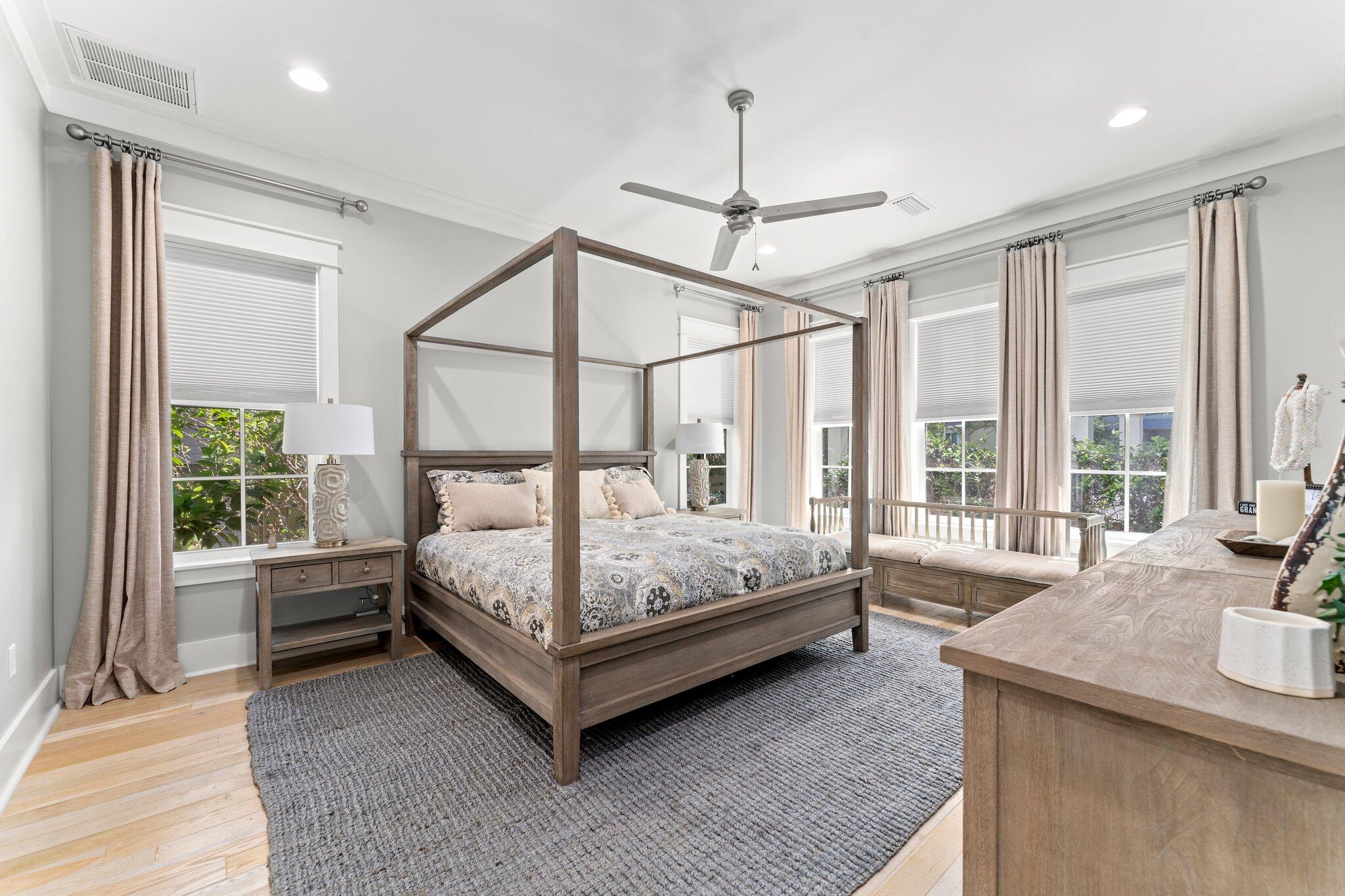 56 South Wisteria Way Santa Rosa Beach, FL 32459 - Photo 23 of 77 a spacious bedroom with a bed and large window