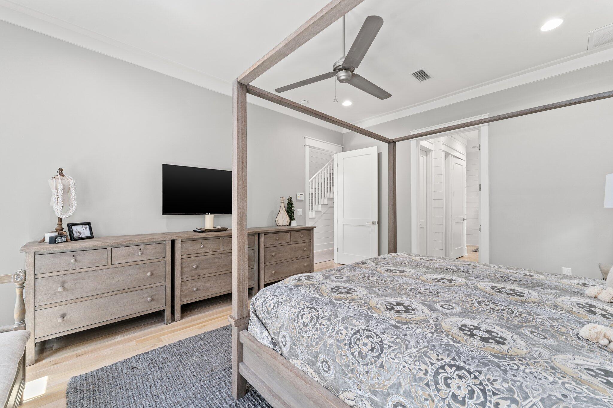 56 South Wisteria Way Santa Rosa Beach, FL 32459 - Photo 25 of 77 a bedroom with a large bed and flat tv screen on dresser