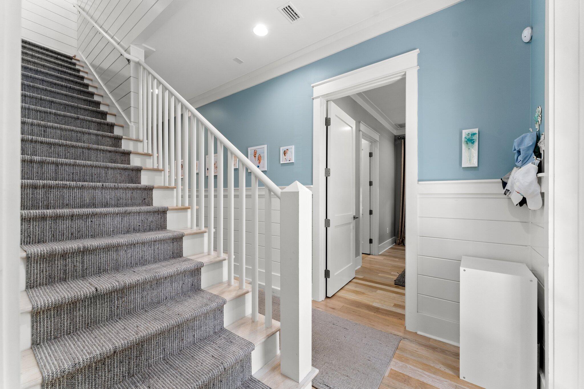 56 South Wisteria Way Santa Rosa Beach, FL 32459 - Photo 37 of 77 a view of entryway and hall with wooden floor