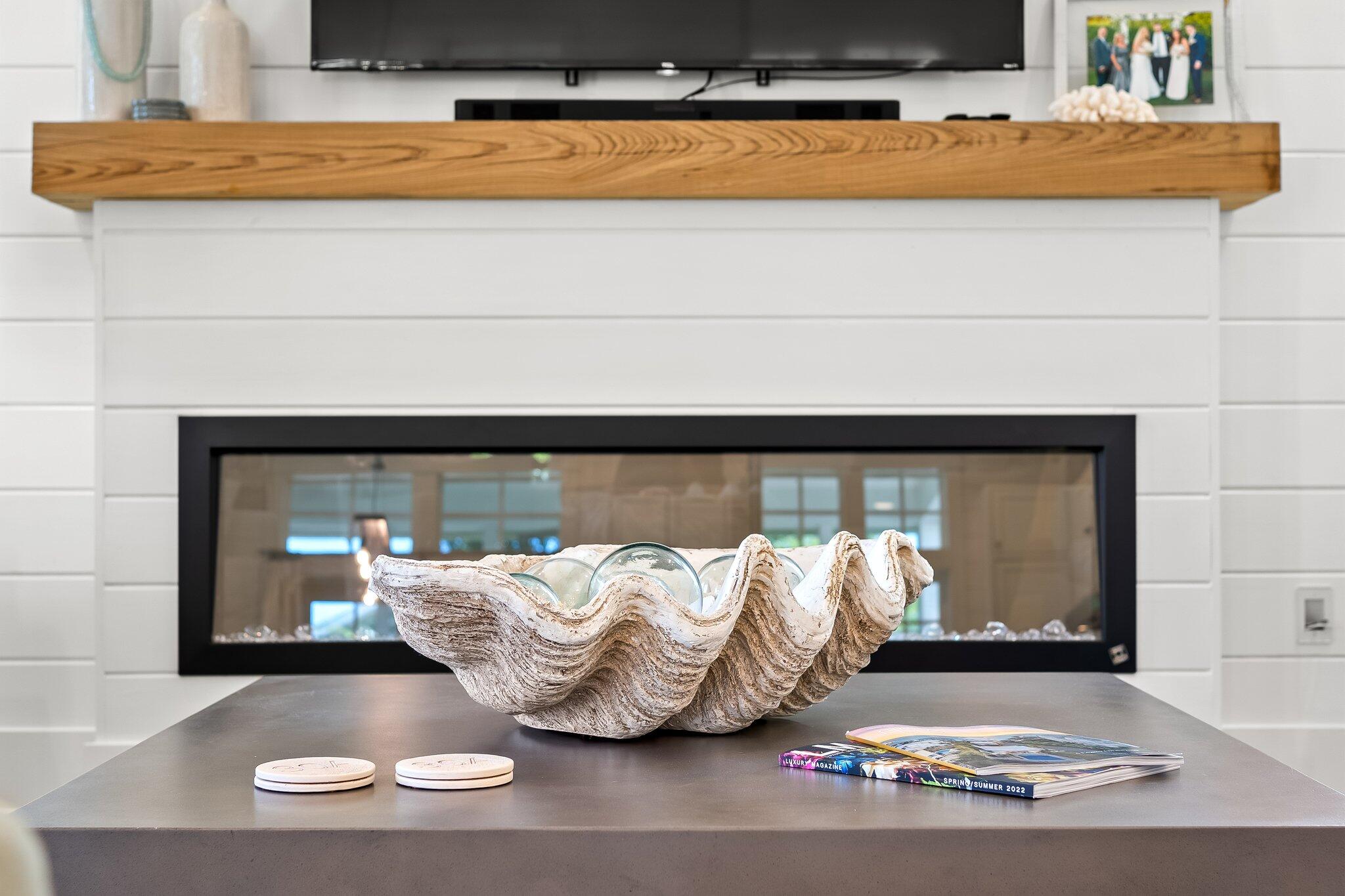 56 South Wisteria Way Santa Rosa Beach, FL 32459 - Photo 59 of 77 a living room with furniture and a fireplace