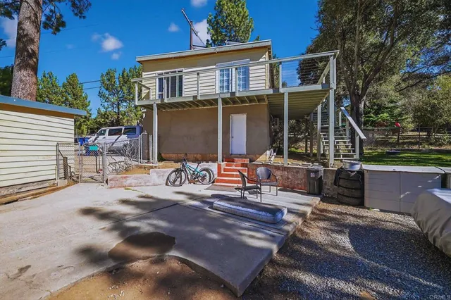 a view of house with outdoor space