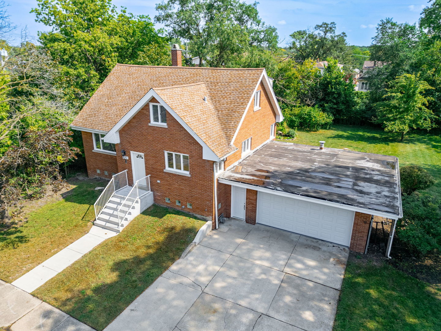4313 Elm Avenue Lyons, IL 60534 - Photo 2 of 34 a view of a house with a yard