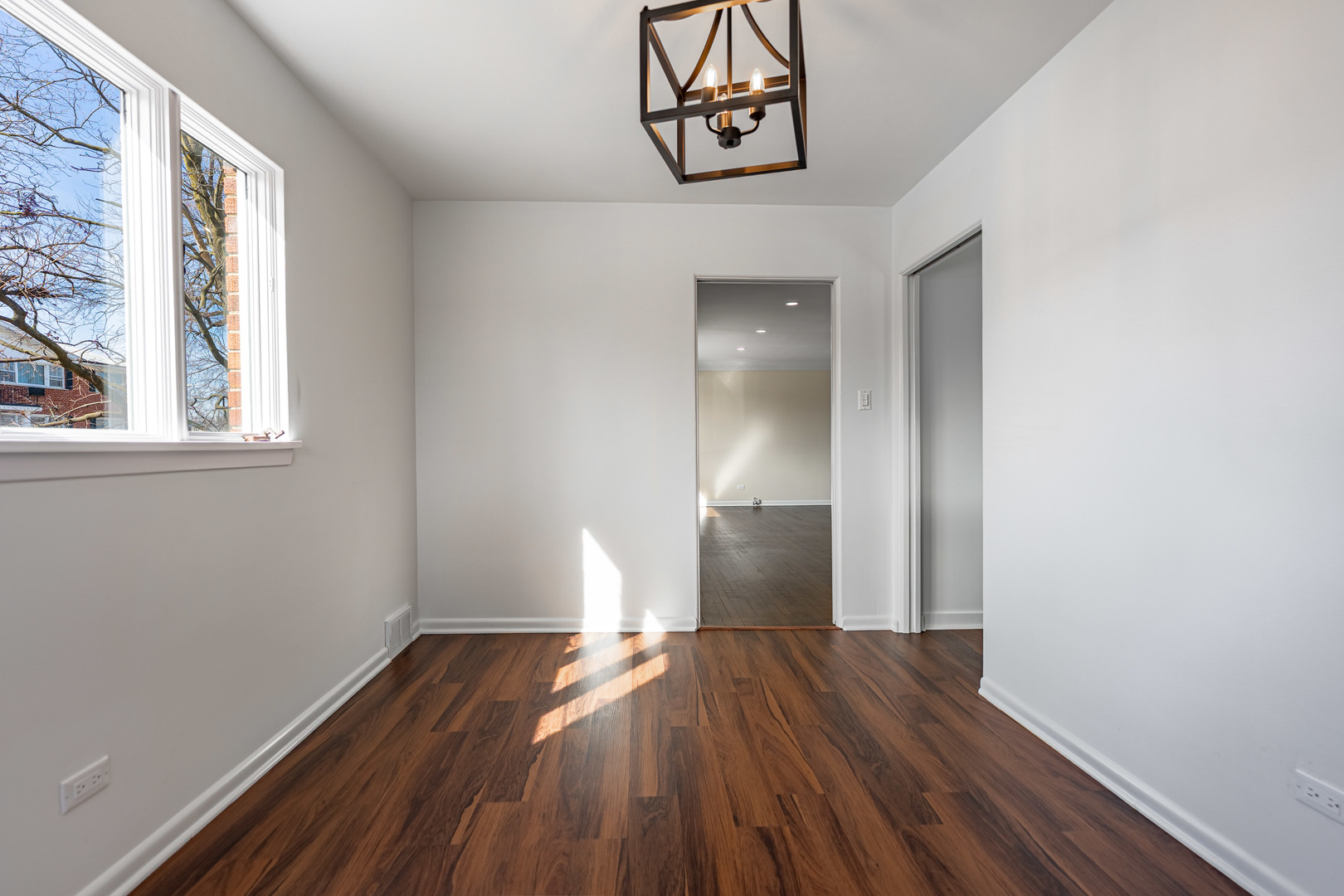 4313 Elm Avenue Lyons, IL 60534 - Photo 8 of 34 a view of empty room with wooden floor