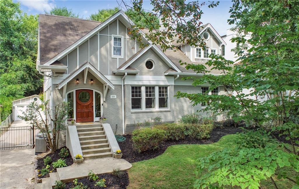 a front view of a house with yard