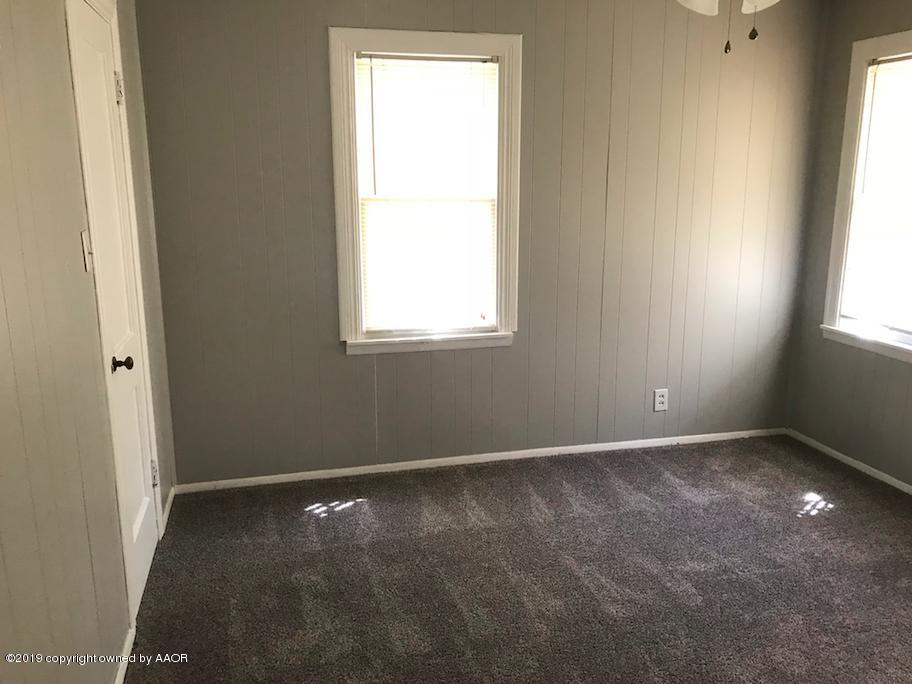 4110 South Lipscomb Street Amarillo, TX 79110 - Photo 11 of 13 an empty room with a window