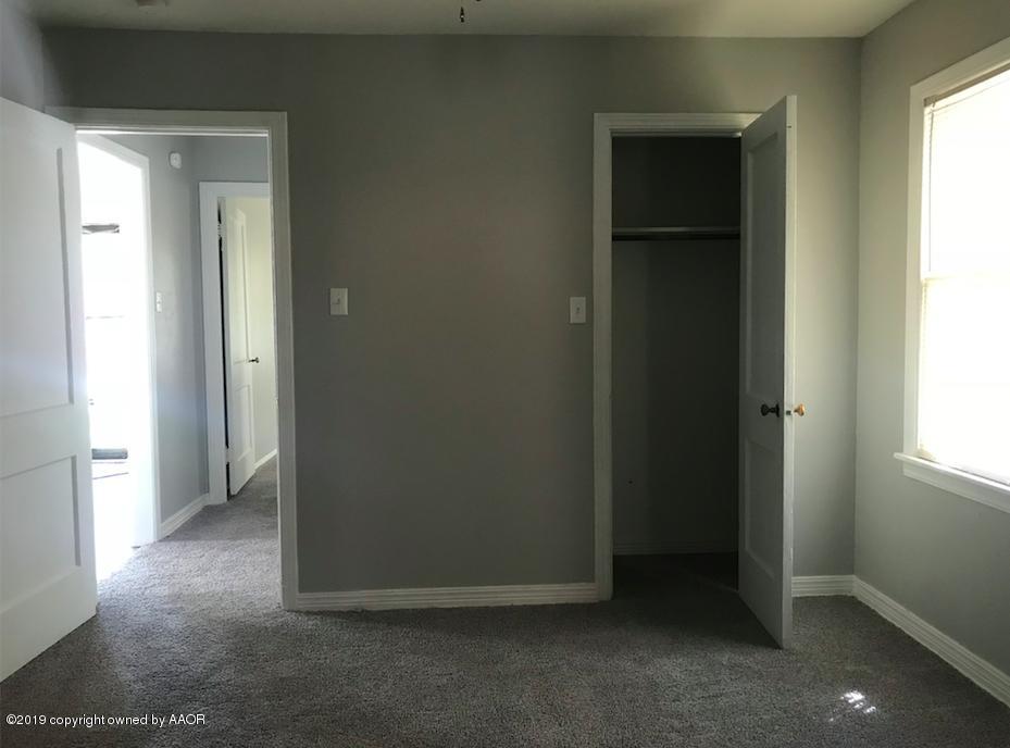 4110 South Lipscomb Street Amarillo, TX 79110 - Photo 13 of 13 an empty room with windows and closet