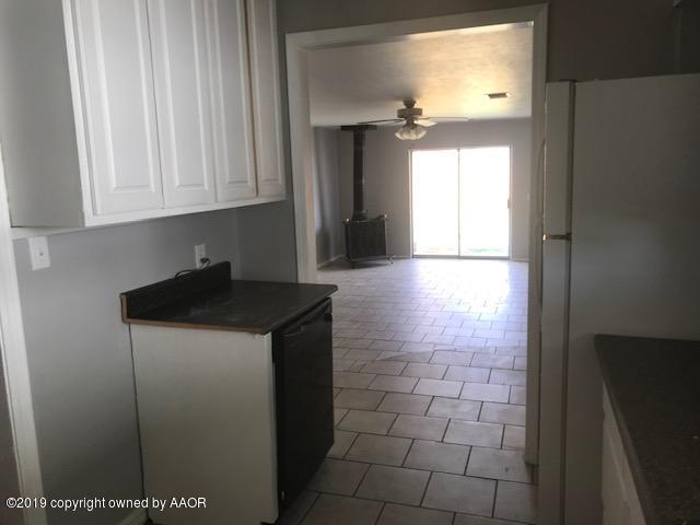 4110 South Lipscomb Street Amarillo, TX 79110 - Photo 4 of 13 a kitchen with a sink and cabinets