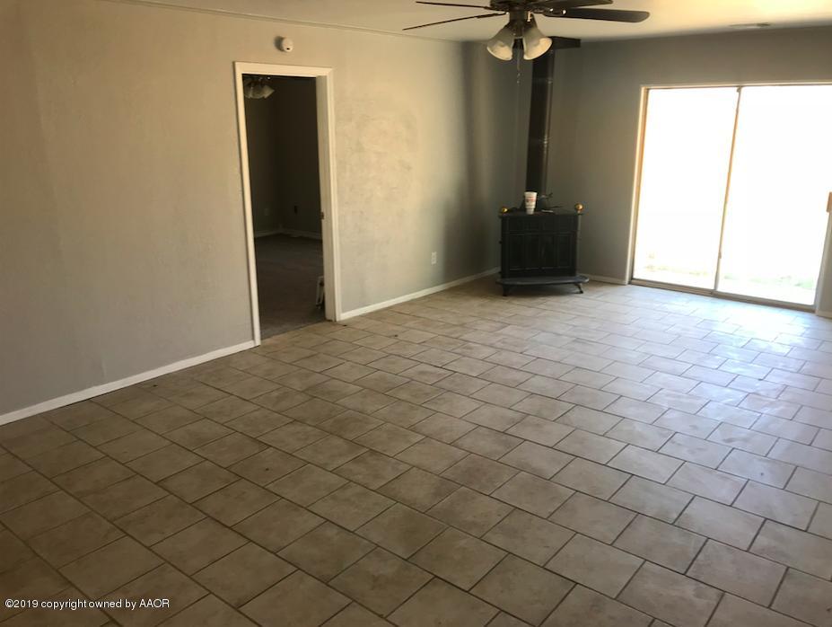 4110 South Lipscomb Street Amarillo, TX 79110 - Photo 7 of 13 an empty room with windows