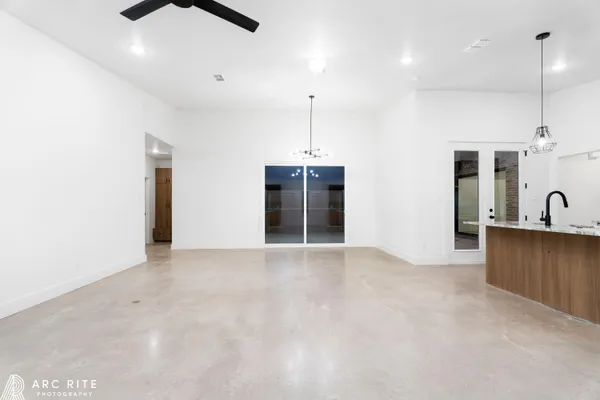 a bathroom with a double vanity sink and mirror
