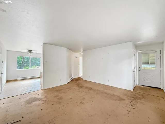 an empty room with windows