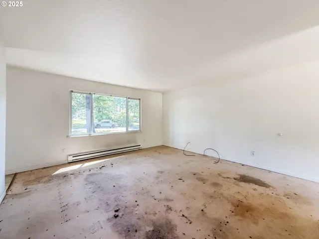 a view of a livingroom with wooden floor