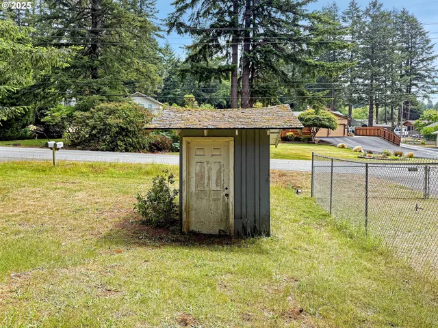 a kitchen with cabinets a sink and appliances
