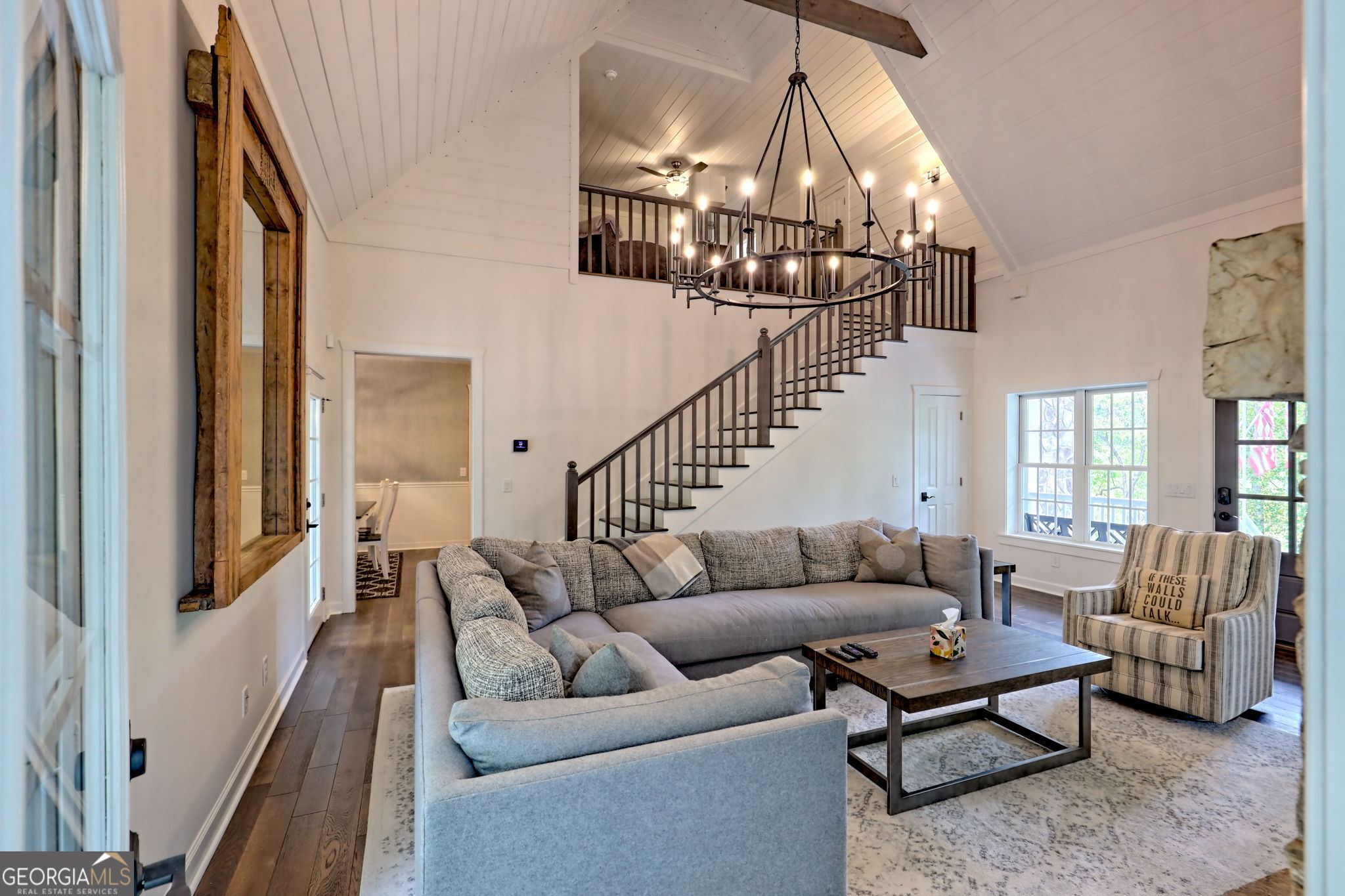 571 Ledford Road Dillard, GA 30537 - Photo 21 of 78 a living room with furniture and a chandelier