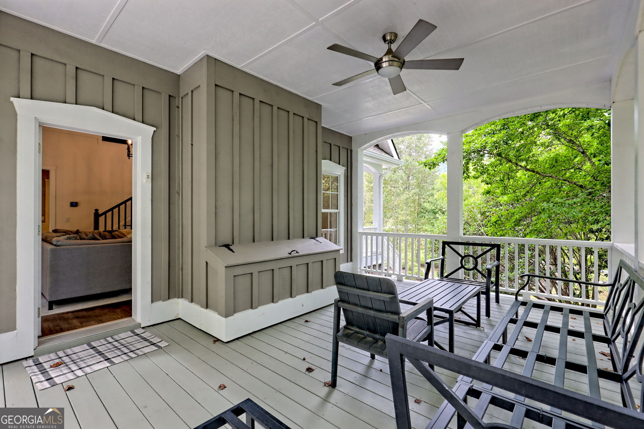 571 Ledford Road Dillard, GA 30537 - Photo 23 of 78 a view of a balcony with furniture and a yard