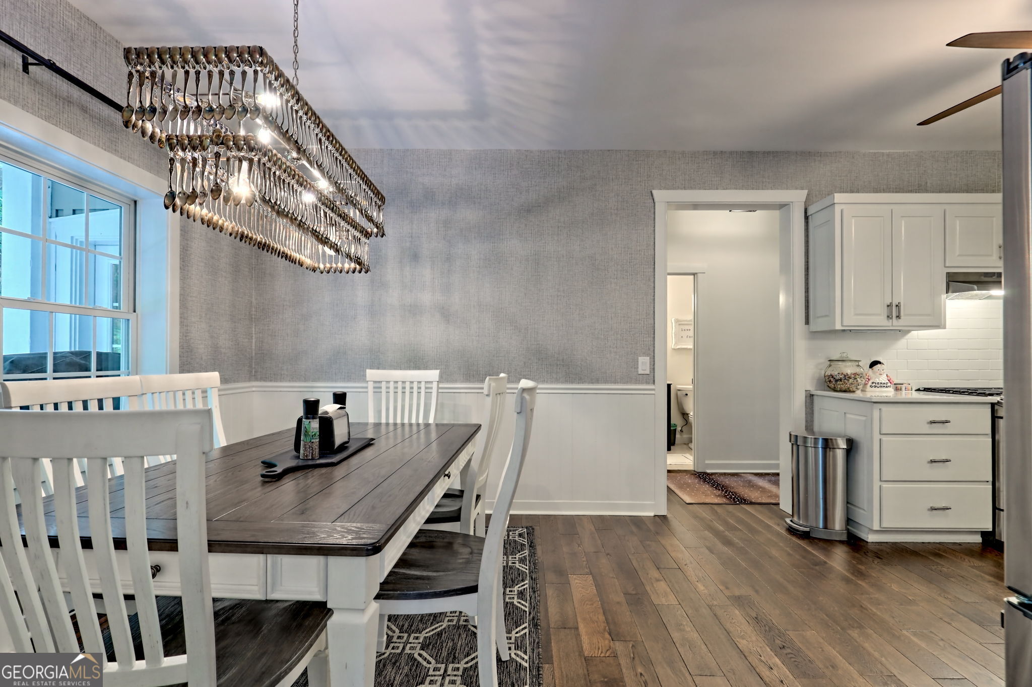571 Ledford Road Dillard, GA 30537 - Photo 28 of 78 a view of a dining room with furniture and wooden floor