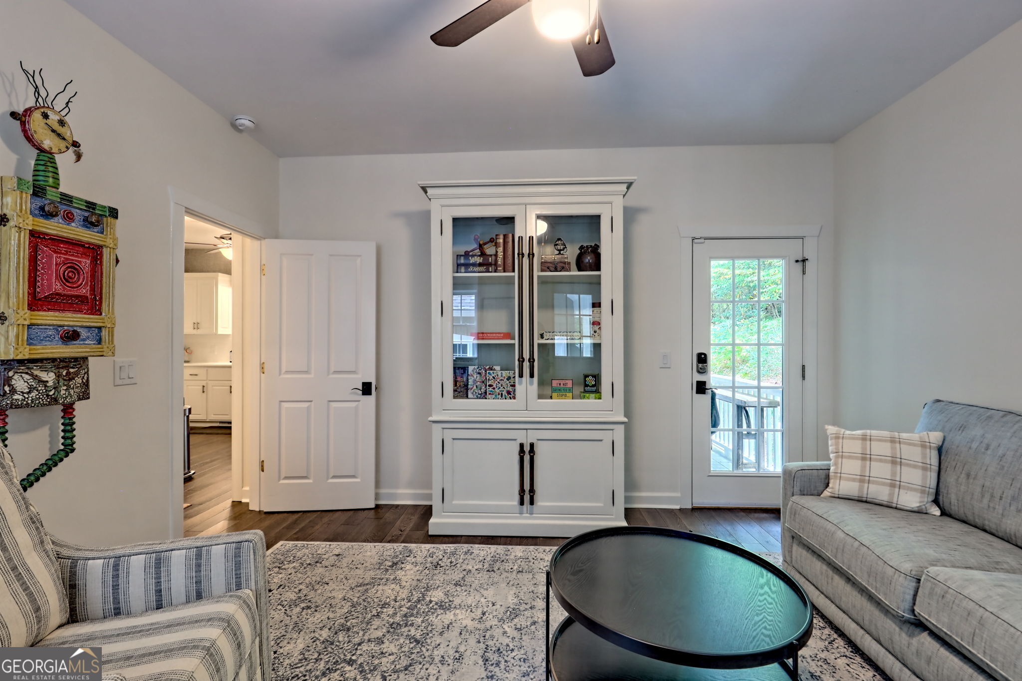 571 Ledford Road Dillard, GA 30537 - Photo 44 of 78 a living room with furniture two window and a potted plant